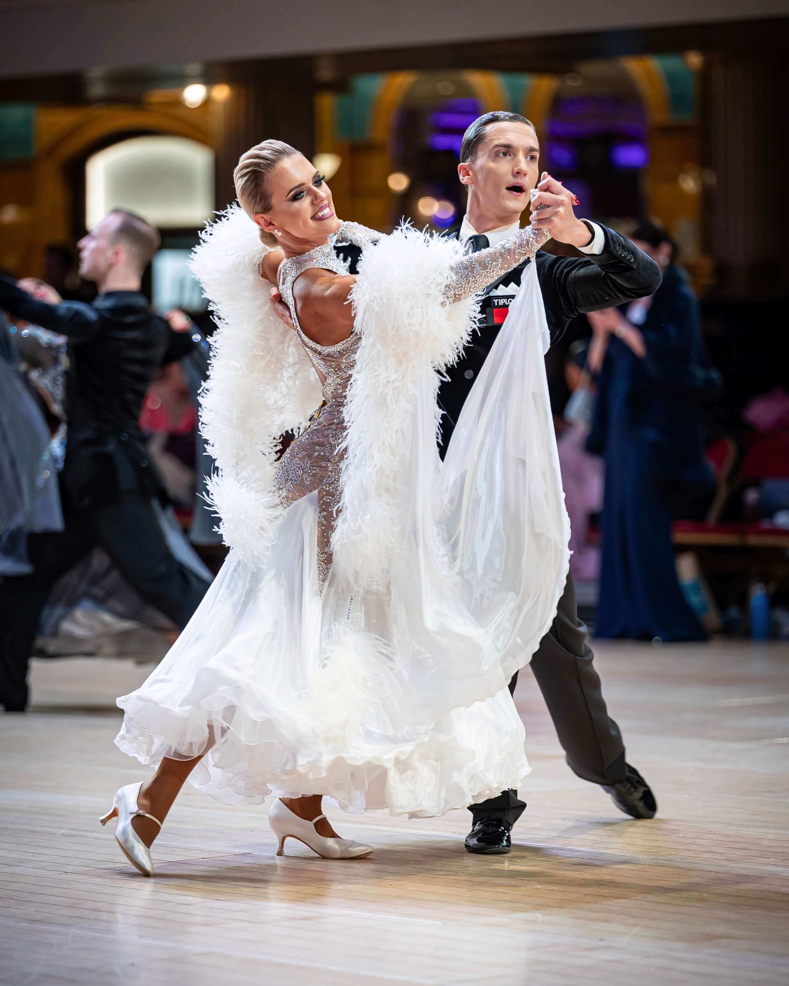 Kathryn competing in ballroom and Latin dance